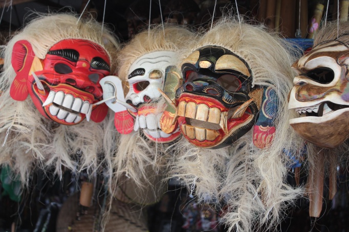 Traditional masks at a local market near Munduk