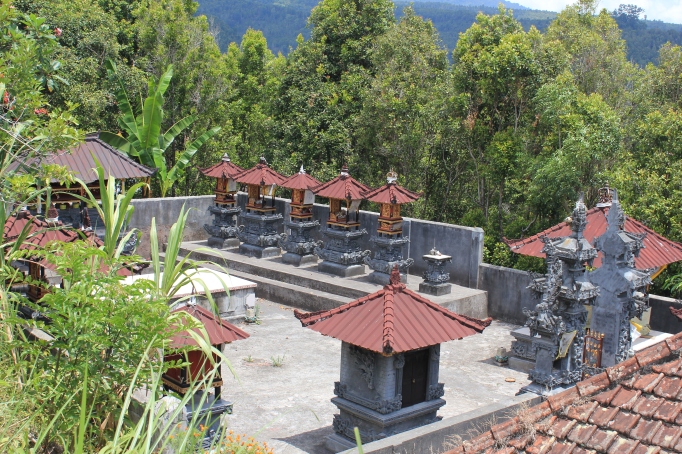 A typical family temple connected to a private home. Each shrine represents different ancestors and gods.